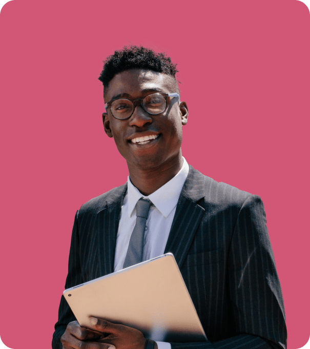 Professional man in a suit holding a digital tablet