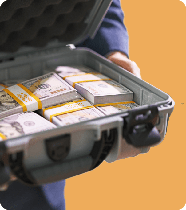 Briefcase filled with stacks of cash for a cash home offer concept