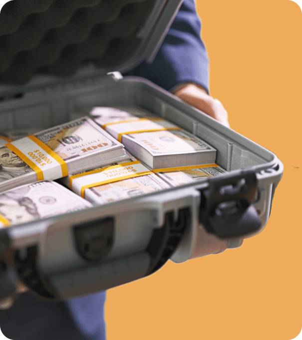 Briefcase filled with stacks of cash for a cash home offer concept